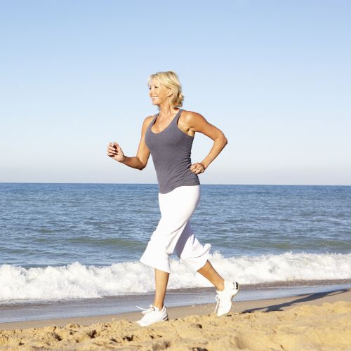 woman running on a beach