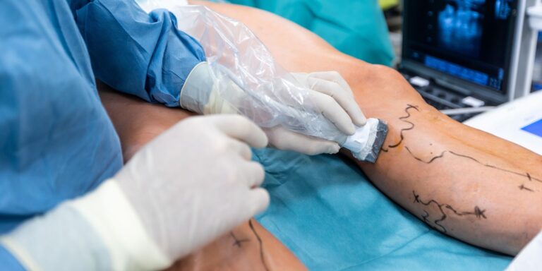 doctor examining for peripheral artery disease