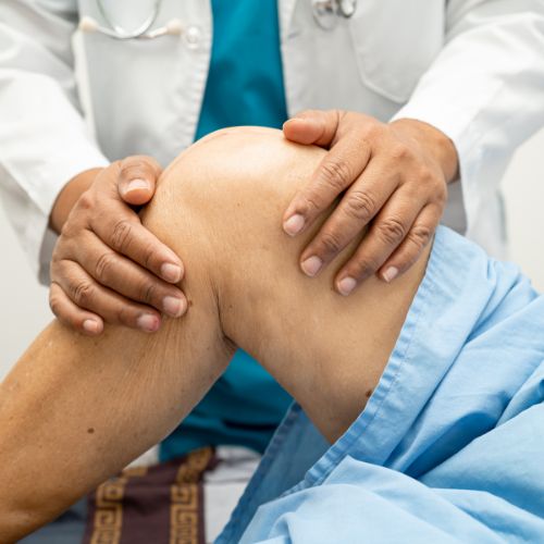 doctor examing patient for new treatments for osteoarthritis of the knee