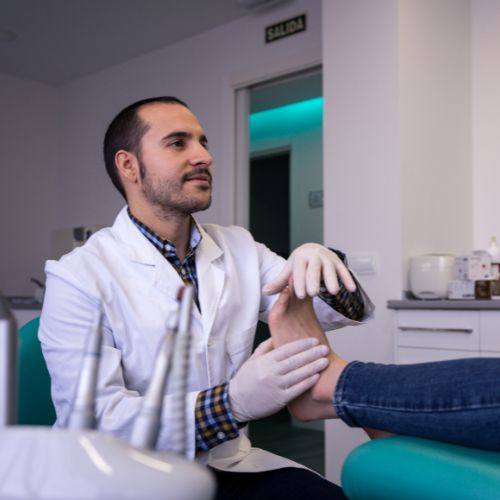 doctor discussing plantar fascia embolization with his patient