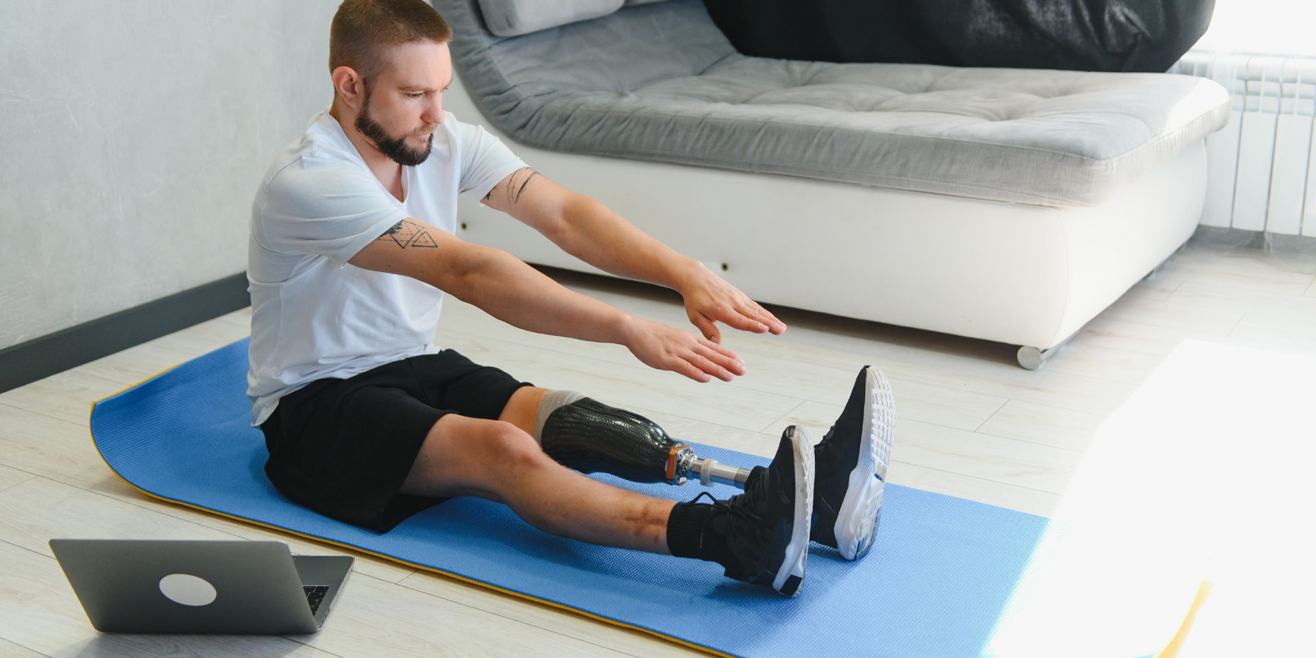 man with an amputated leg doing physical therapy