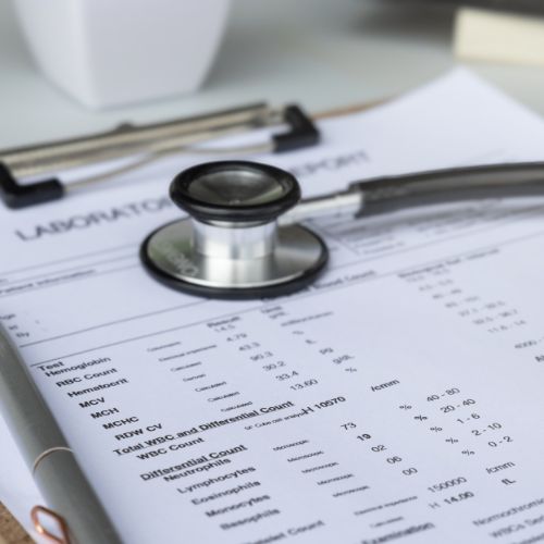 stethoscope on top of a referral to see a vascular surgeon