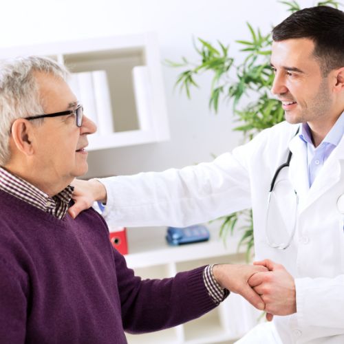 Doctor and patient discussing dialysis access surgery options