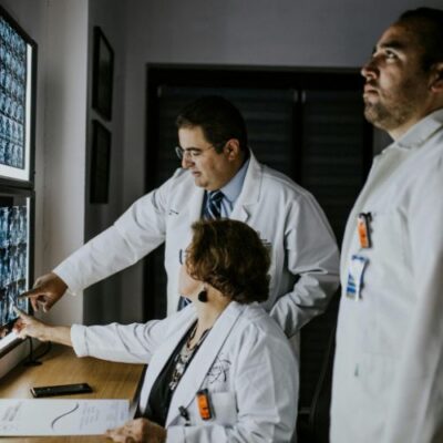 vascular surgeons examining a patient’s X-rays