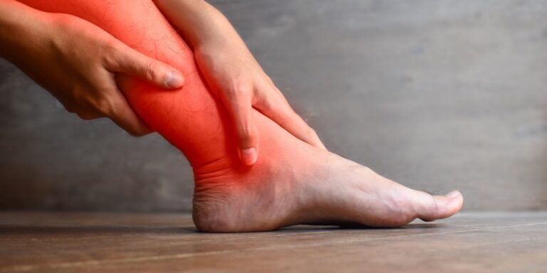 person with leg pain highlighted in red