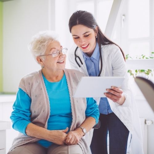 doctor show patient ways to prevent varicose veins